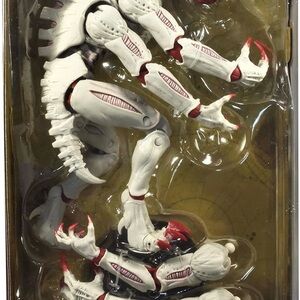 White and Red Alien Action Figure
